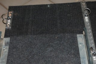 Behind fridge slide - battery cargo rails and securing points