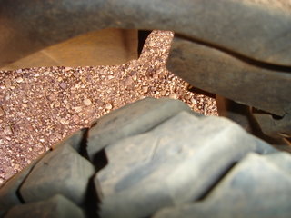 wheel fully turned outward (inside gap)