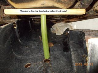 The shadow exagerates the 6mm dent