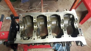 Block on stand being cleaned up.jpg